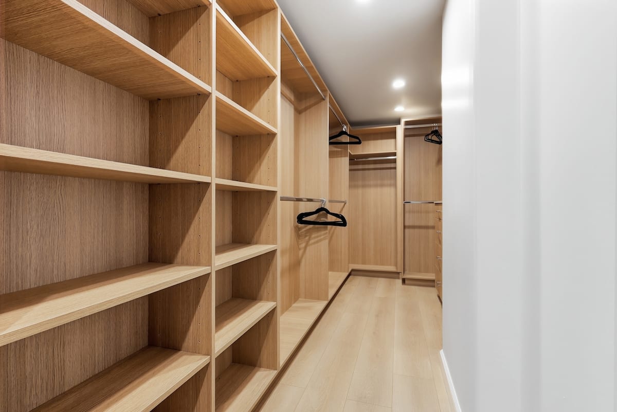 Generous walk-in closet with custom storage